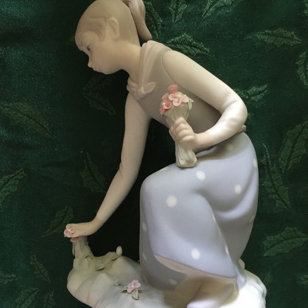 Retired Lladro Girl Gathering Flowers